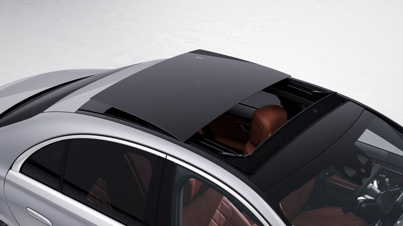 На иллюстрации изображена панорамная крыша со сдвижным люком седана S-Класса Mercedes-Benz.